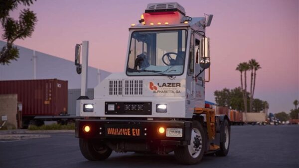a white lazer logistics orane ev electric yard truck